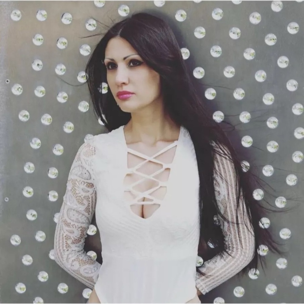 women's lace body top. White with lacing